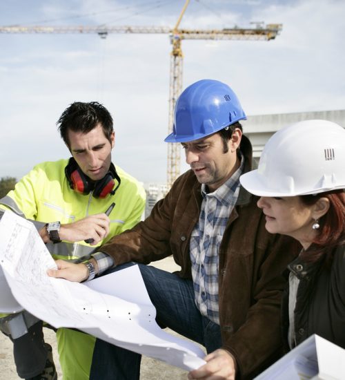 Construction,Team,Looking,At,Plans Construction,Team,Looking,At,Plans